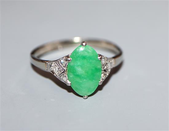 A 1920s? 18ct white meat and Plat and jadeite ring with diamond set shoulders (setting a.f.), size Q.